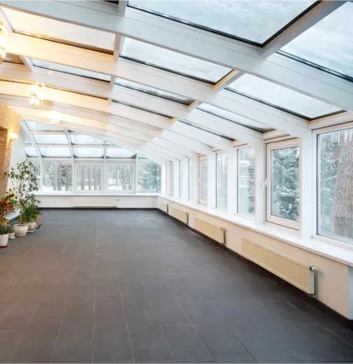 Bright uPVC conservatory extension with garden views